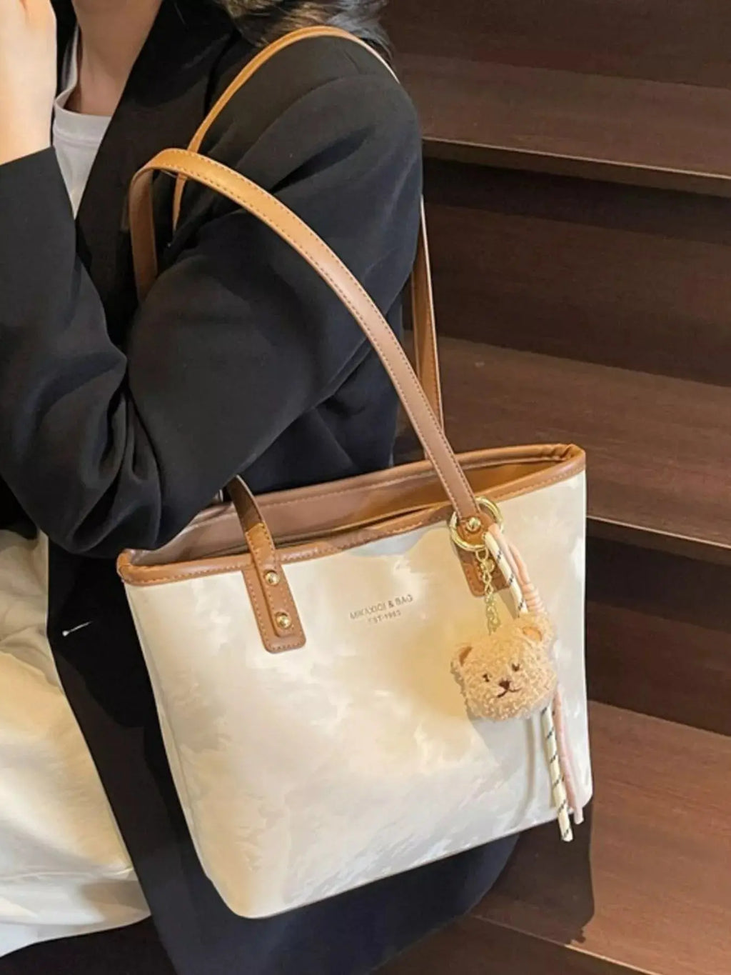 Vegan leather tote shoulder bag with plush bear charm, front view Vicsxox.com