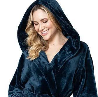 Woman wearing a dark blue hooded robe on a white background. Vicsxox.com