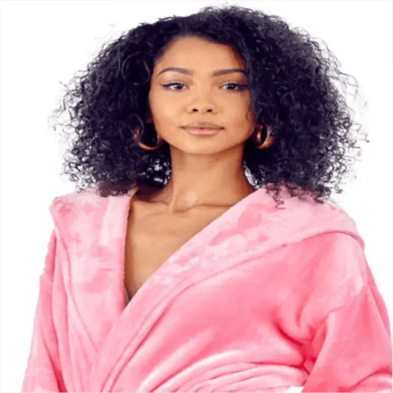 Woman wearing a pink robe against a white background. Vicsxox.com