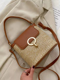 Woven straw crossbody bag with leather flap, front view Vicsxox.com