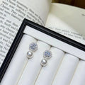 Zircon pearl drop earrings from Vicsxox on display