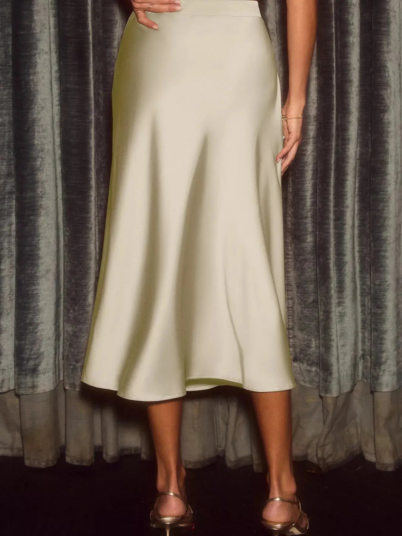 Satin midi skirt styled on model