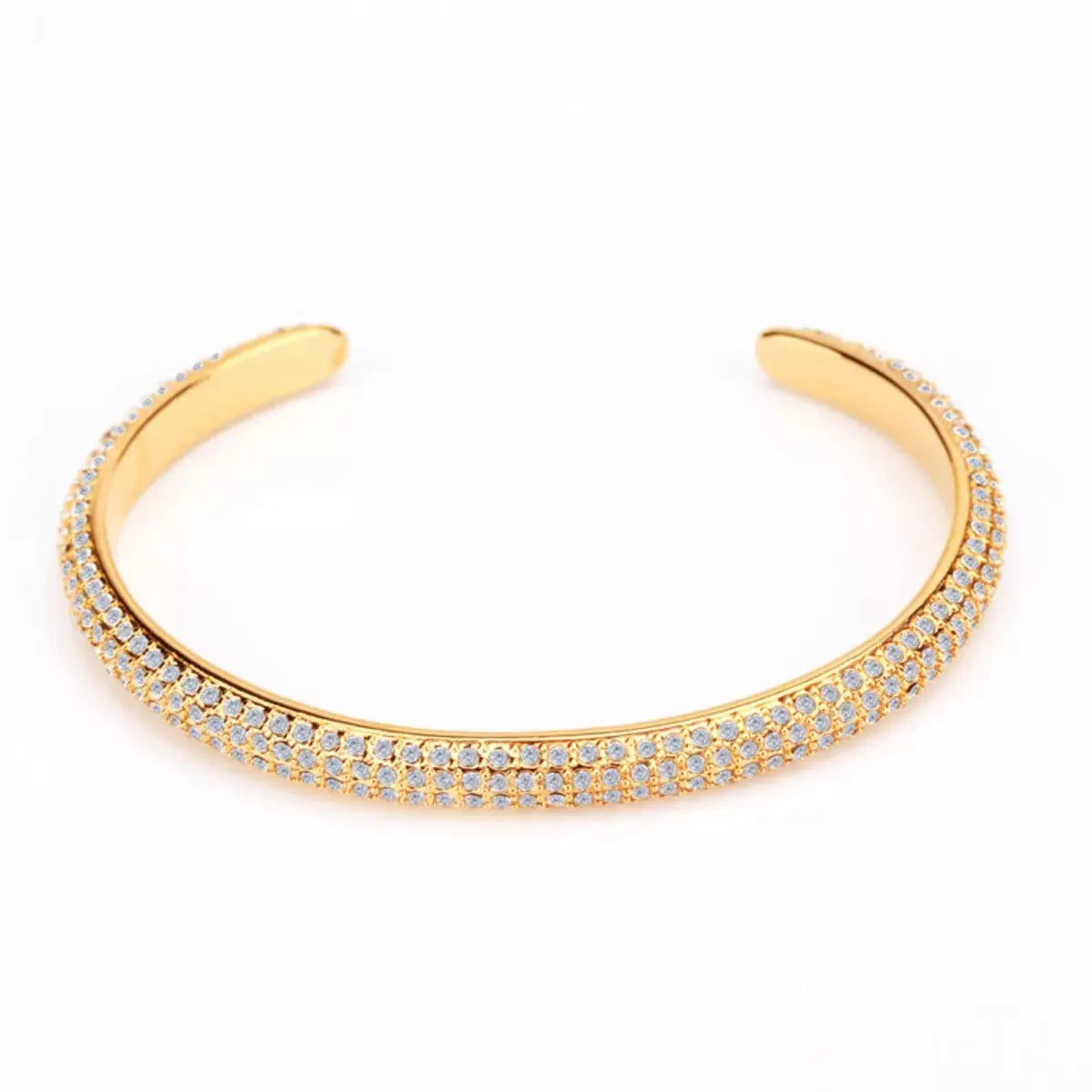Woman wearing gold zircon open bracelet