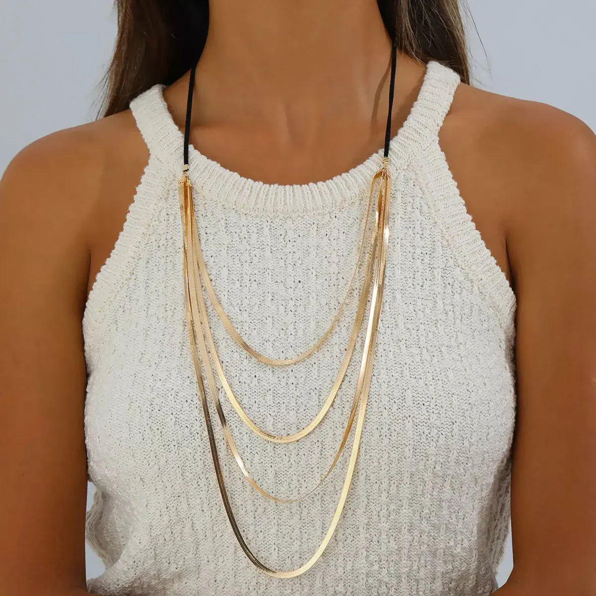 Multi-layered snake chain necklace detail