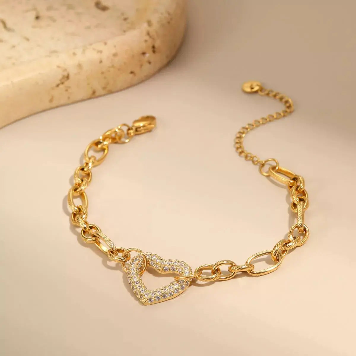 Woman wearing gold rhinestone chain bracelet