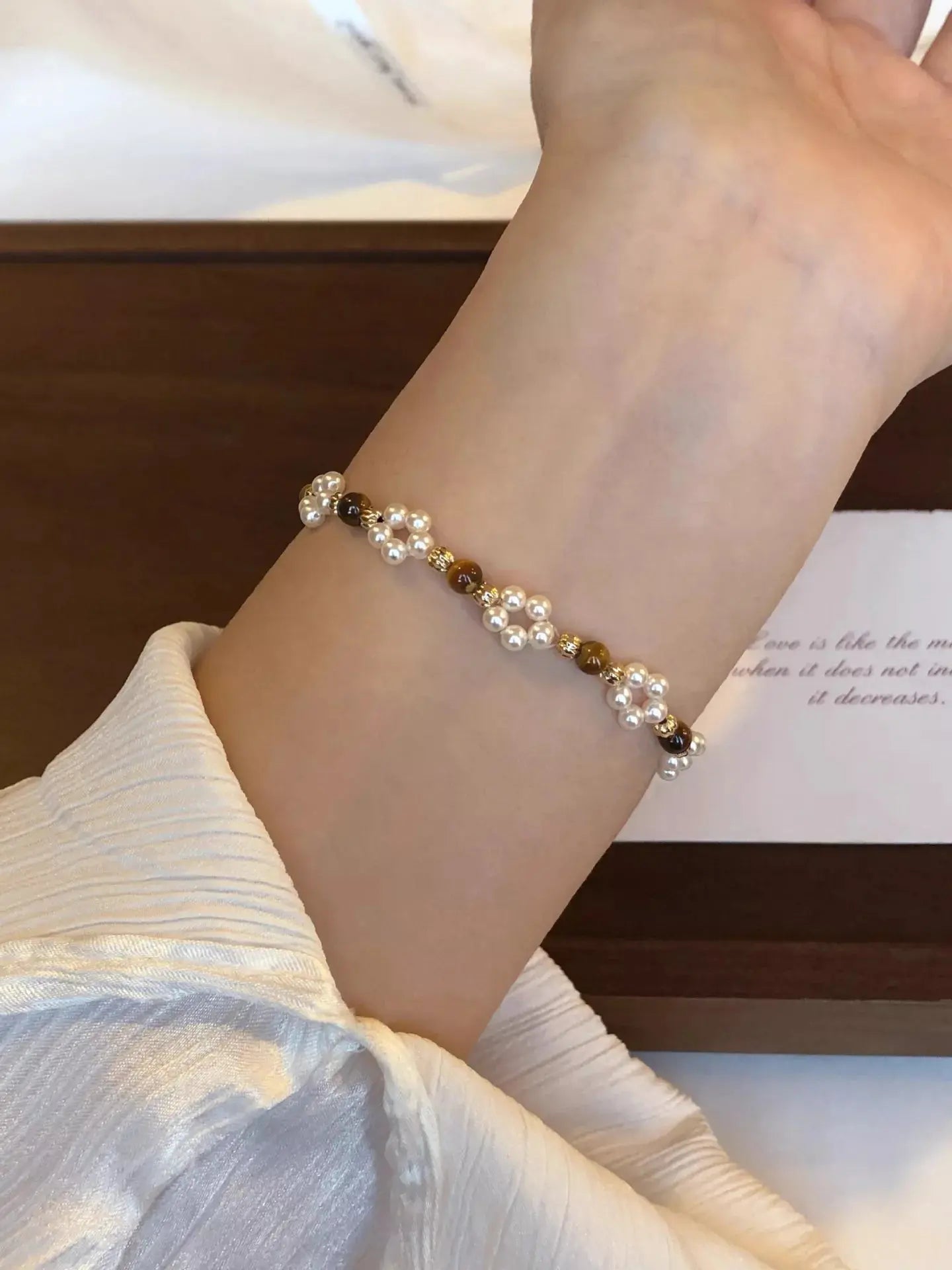 Close-up of tiger eye stone beads on bracelet