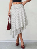 Polka dot asymmetrical hem midi skirt, front view