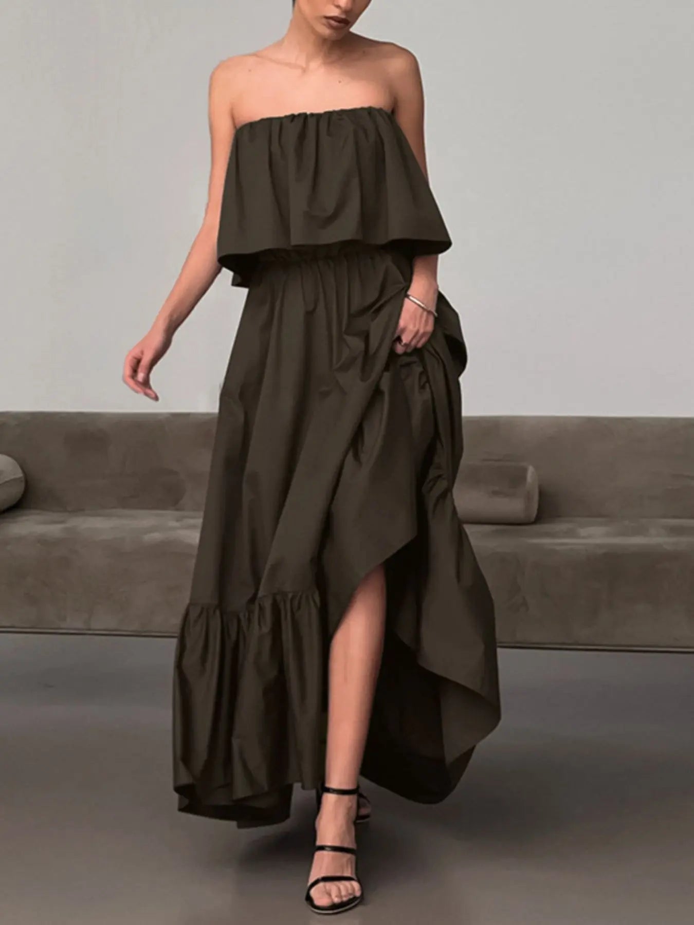 Woman wearing an off-shoulder ruffle hem maxi dress from Vicsxox
