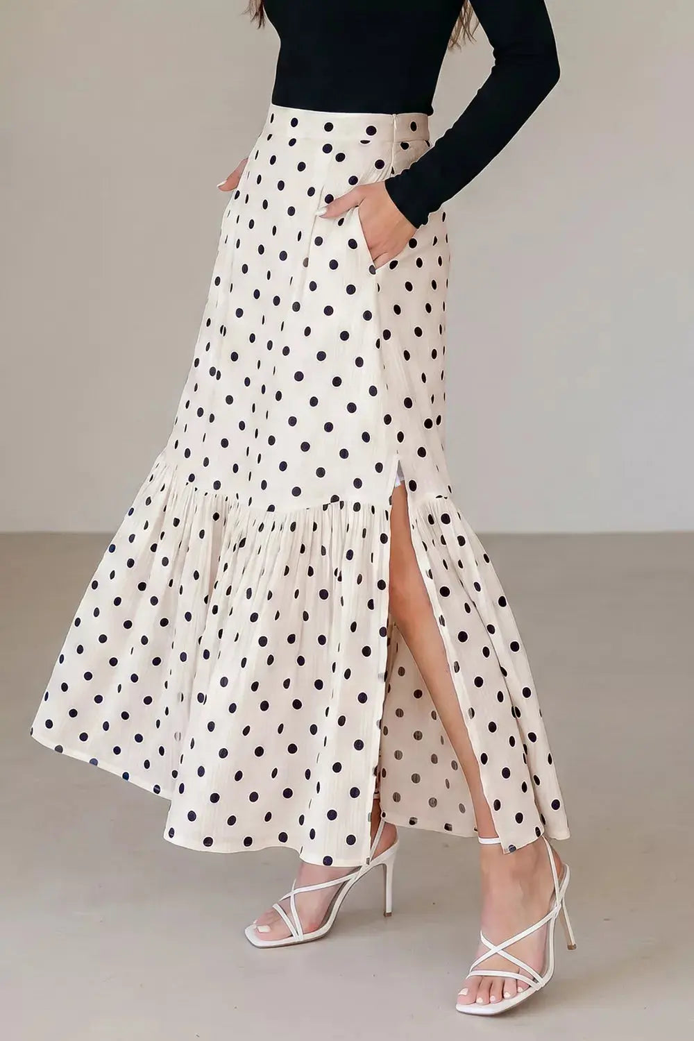 Polka dot ruffled maxi skirt detail