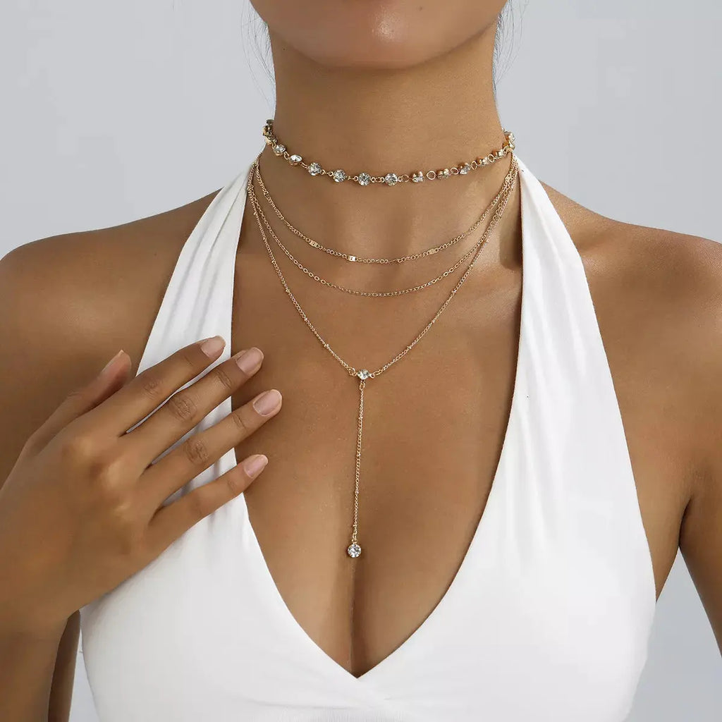 Close-up of rhinestone detail on layered choker