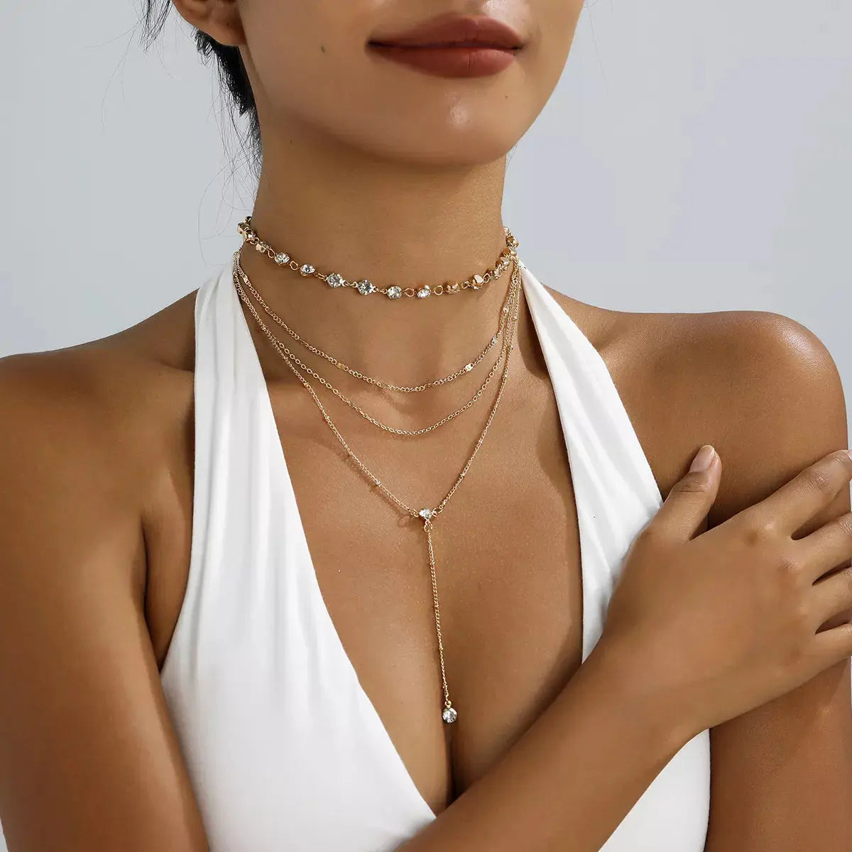 Woman wearing multi-layered rhinestone choker necklace