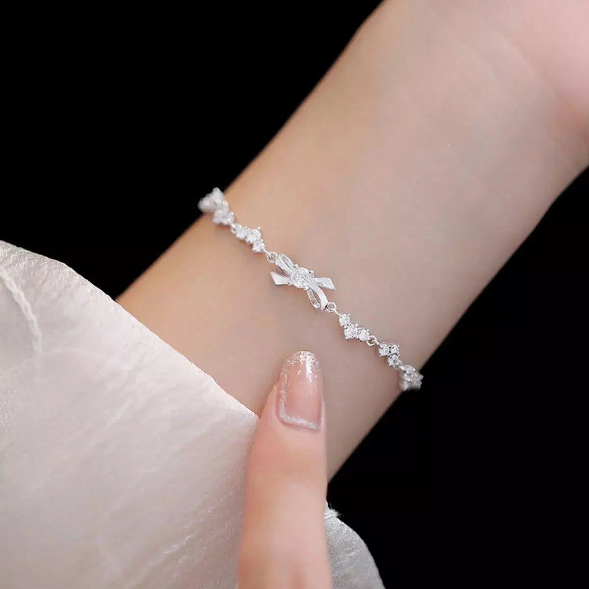 925 sterling silver chain bow bracelet from Vicsxox