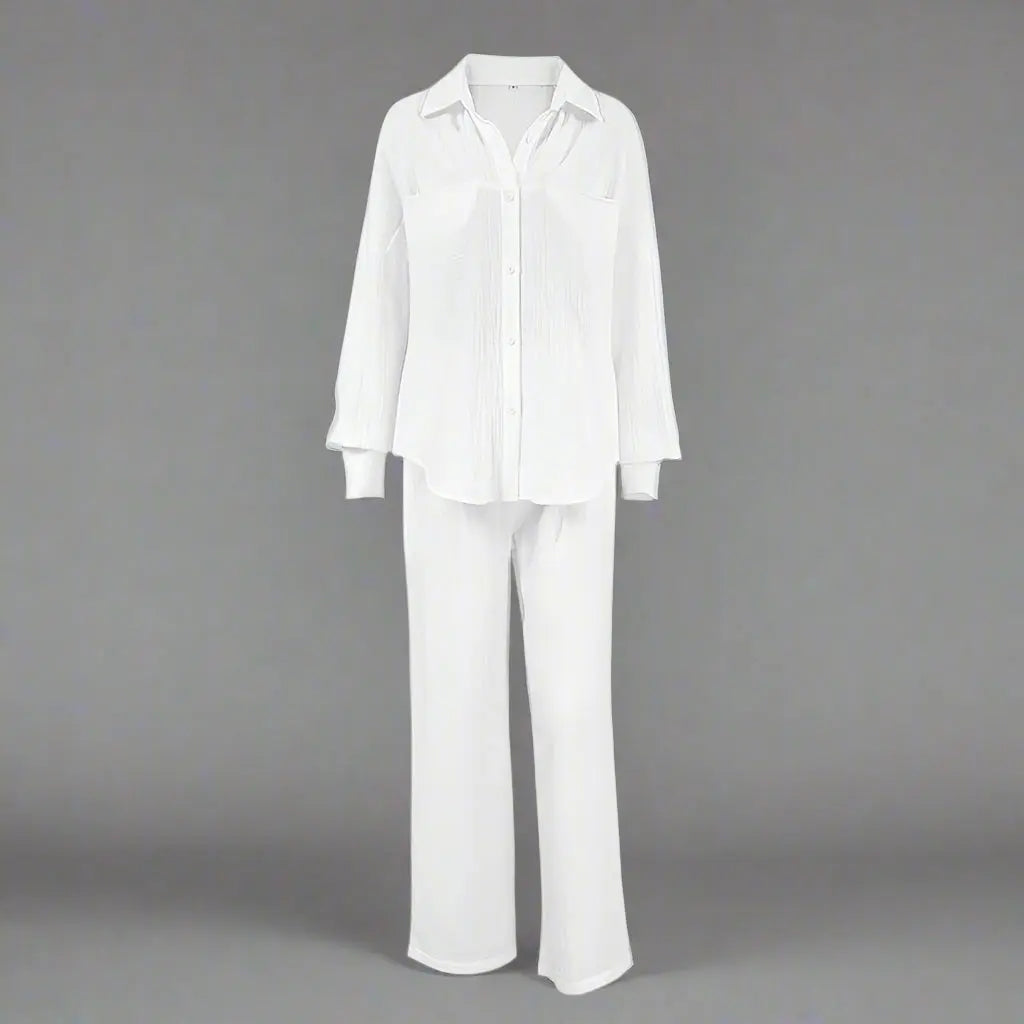 White shirt and pants set on a gray background