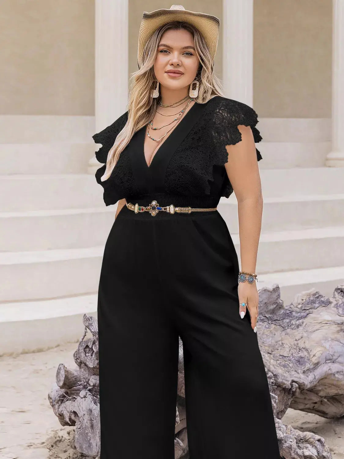Close-up of lace cap sleeve detail on plus-size jumpsuit