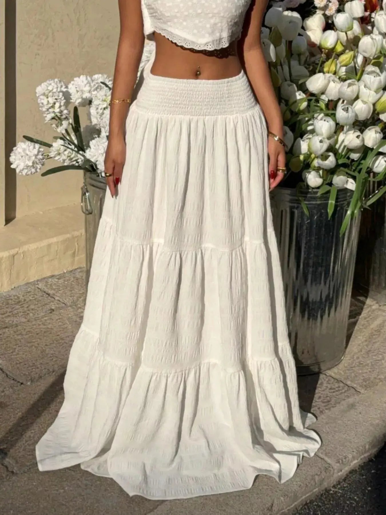 Smocked tiered maxi skirt styled on model