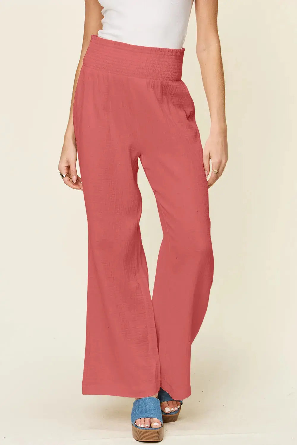 Smocked waist wide leg pants detail