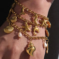 18K gold-plated sea shell charm bracelet from Vicsxox