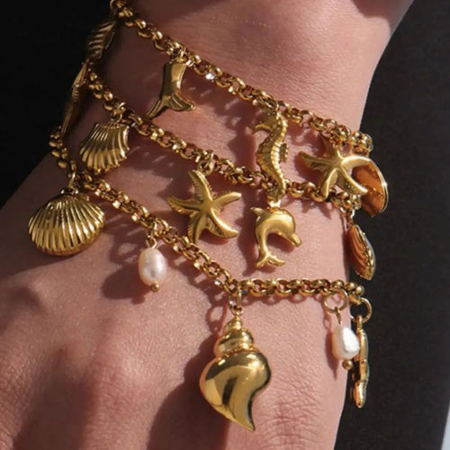 18K gold-plated sea shell charm bracelet from Vicsxox