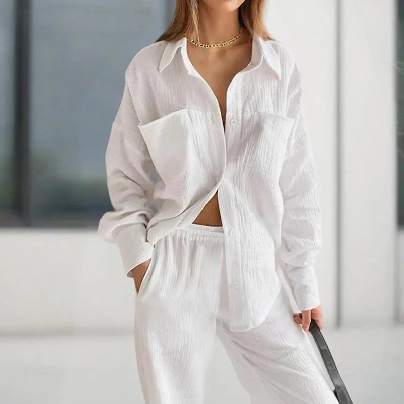 Person wearing a white outfit with a blurred background