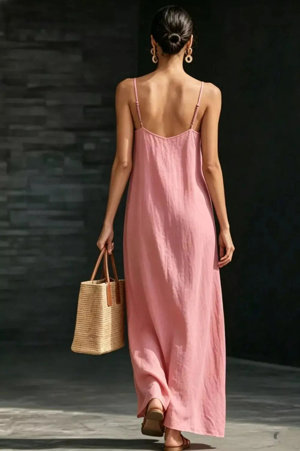 Close-up of leg slit on v-neck maxi dress