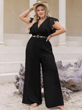 Woman wearing a plus-size lace cap sleeve wide leg jumpsuit from Vicsxox