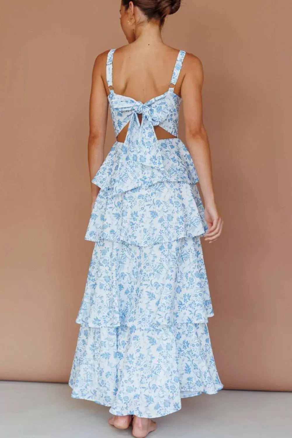 Close-up of tiered ruching on floral maxi dress