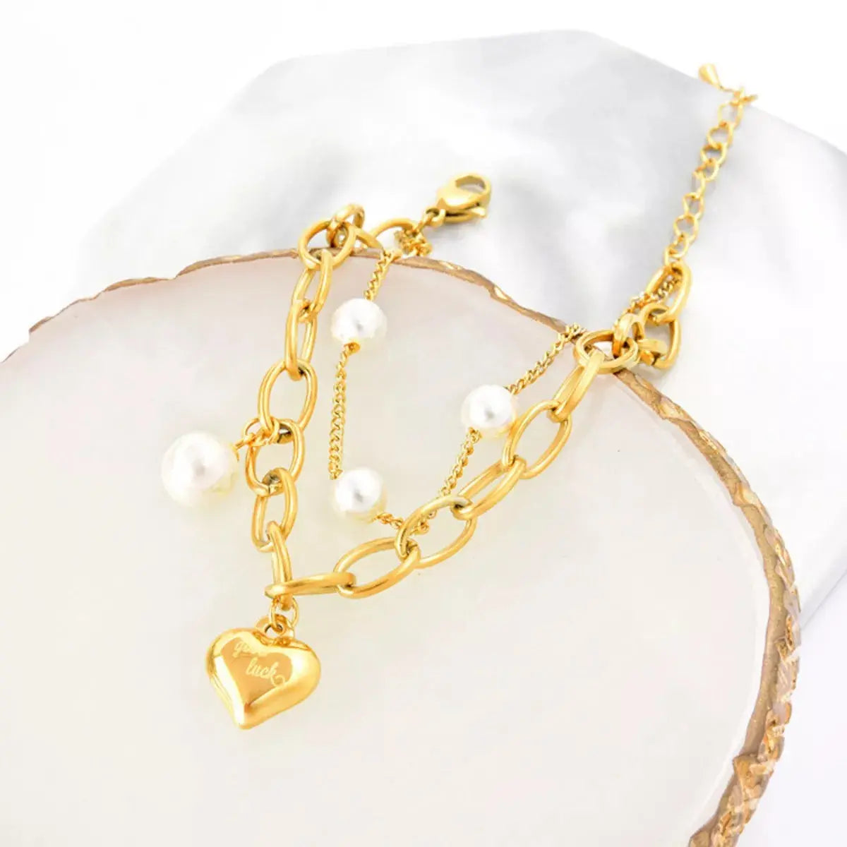 18K gold-plated pearl heart charm bracelet from Vicsxox
