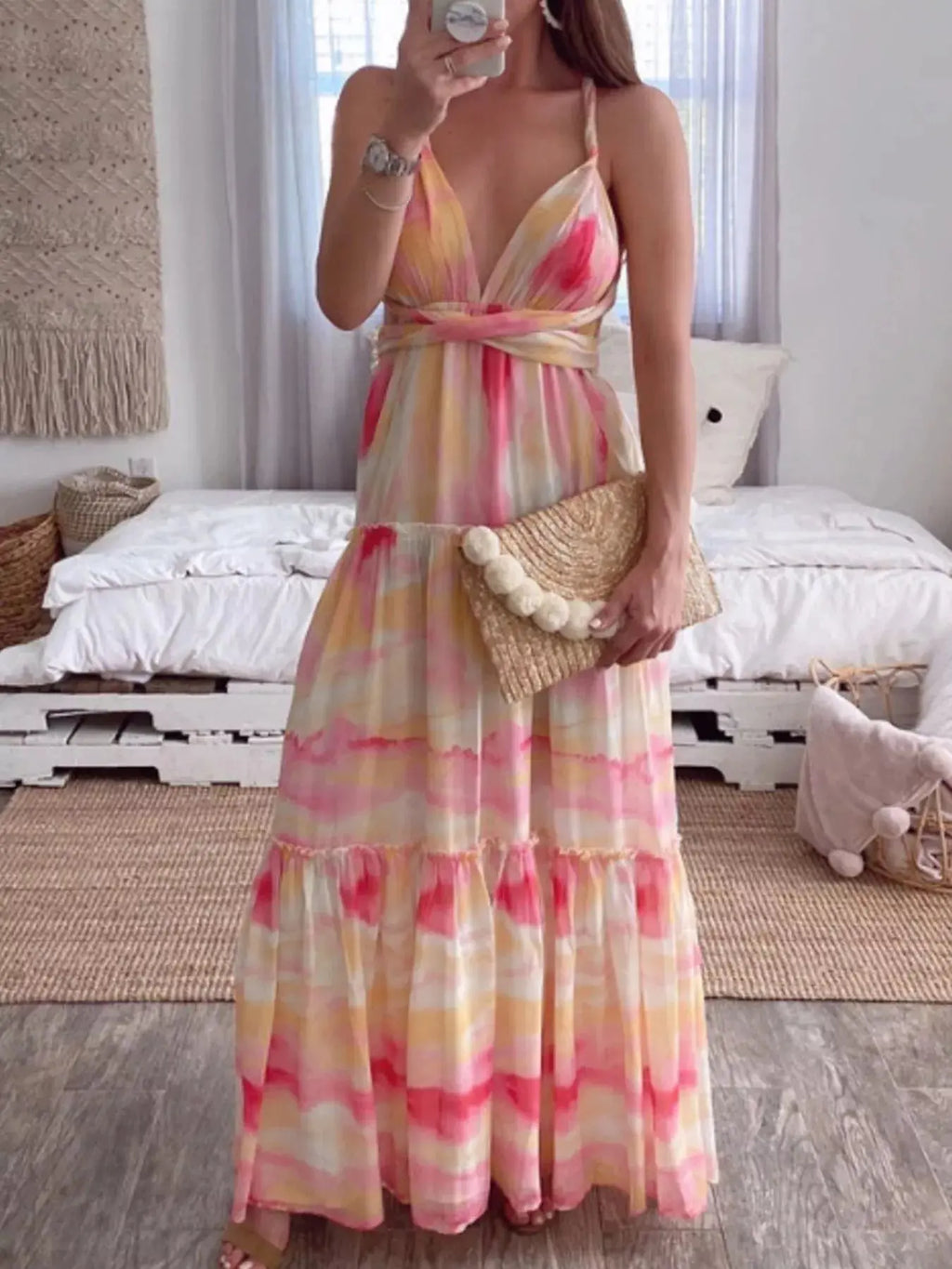 Close-up of tie-dye print on tiered maxi dress