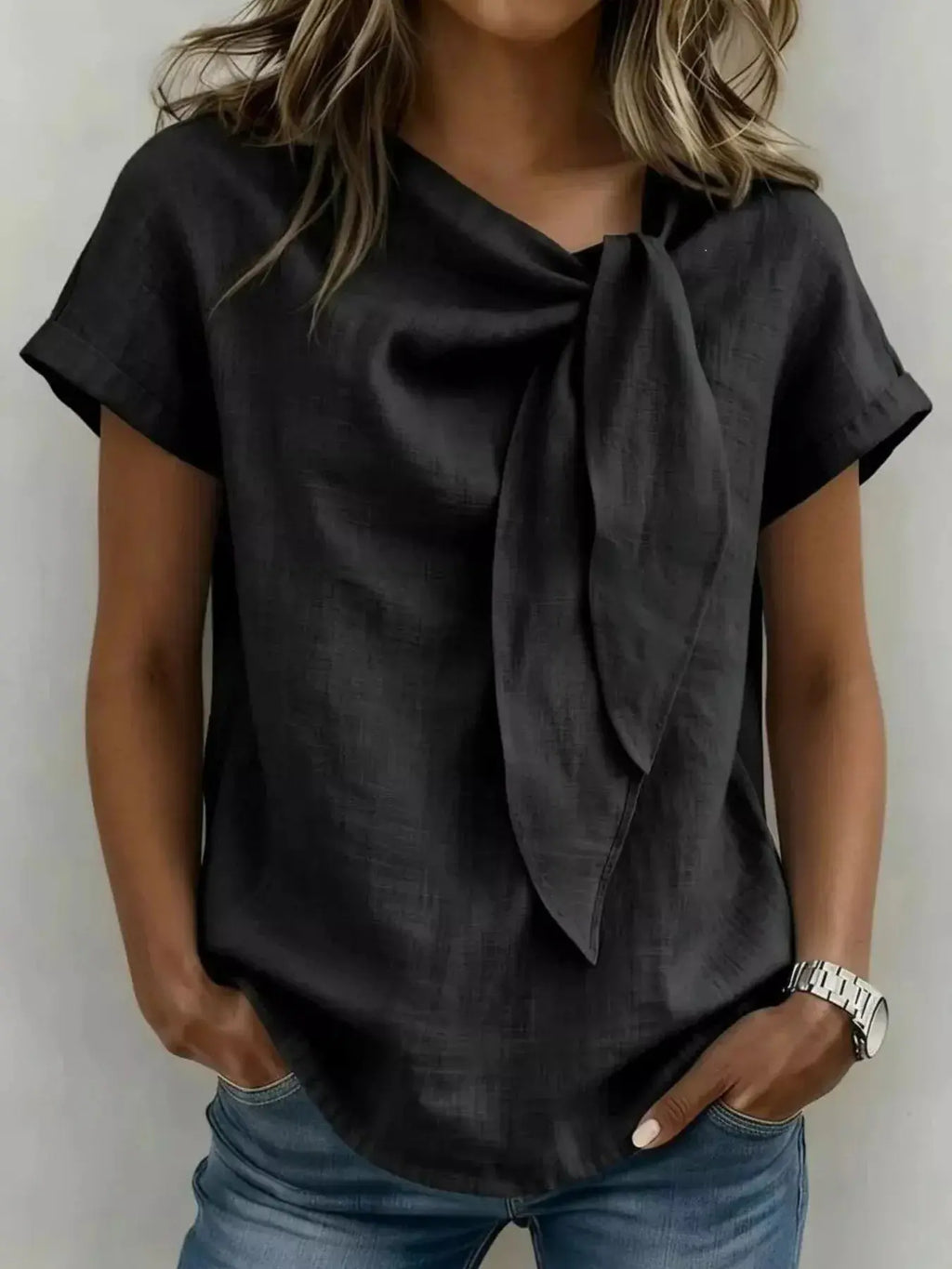 Back view of plus-size bow tie neck short sleeve blouse