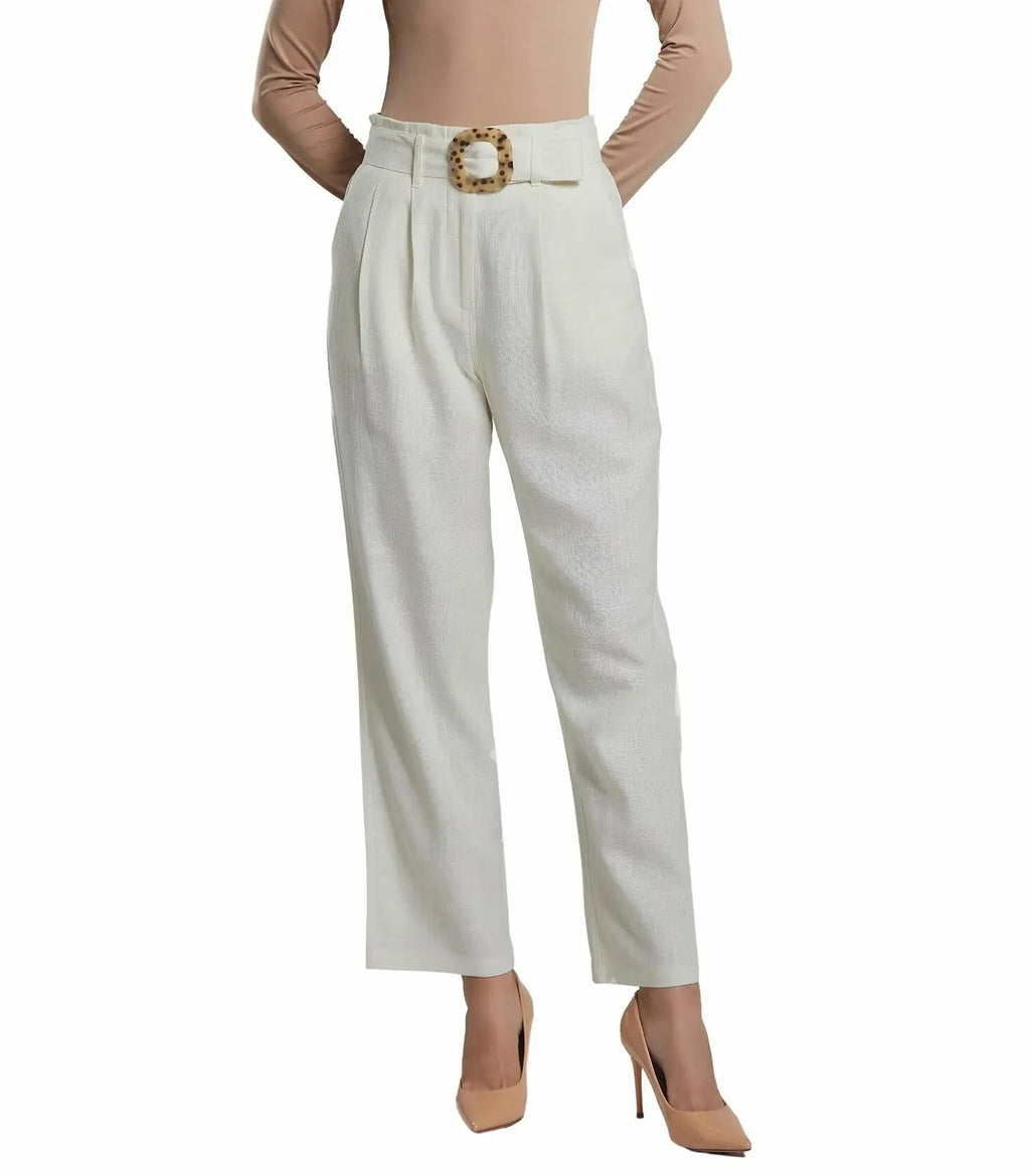 White pants with a belt worn by a person on a white background